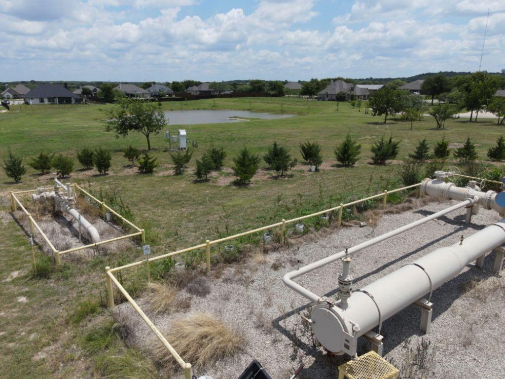 3322 Mariposa Ridge Crowley, TX 76036 - Photo 26 of 34 a view of a lake from a yard
