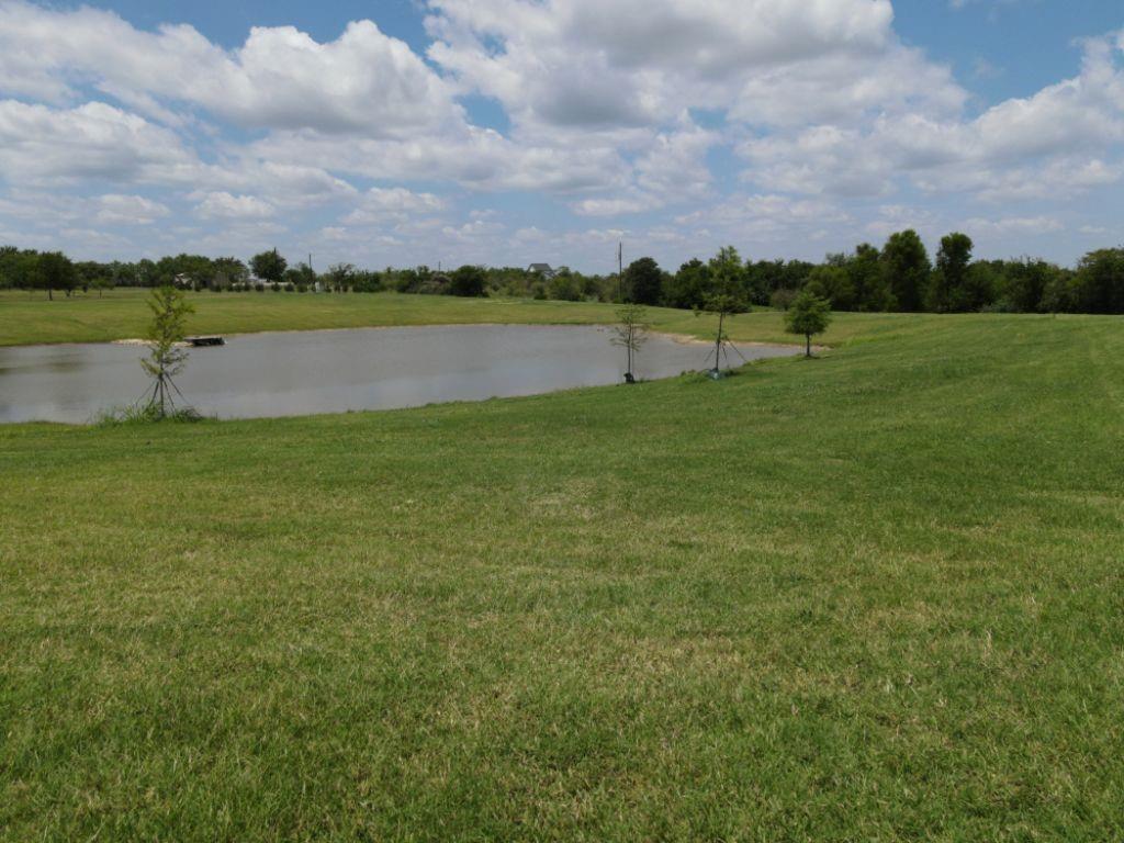 3322 Mariposa Ridge Crowley, TX 76036 - Photo 31 of 34 a view of a lake with houses in the background