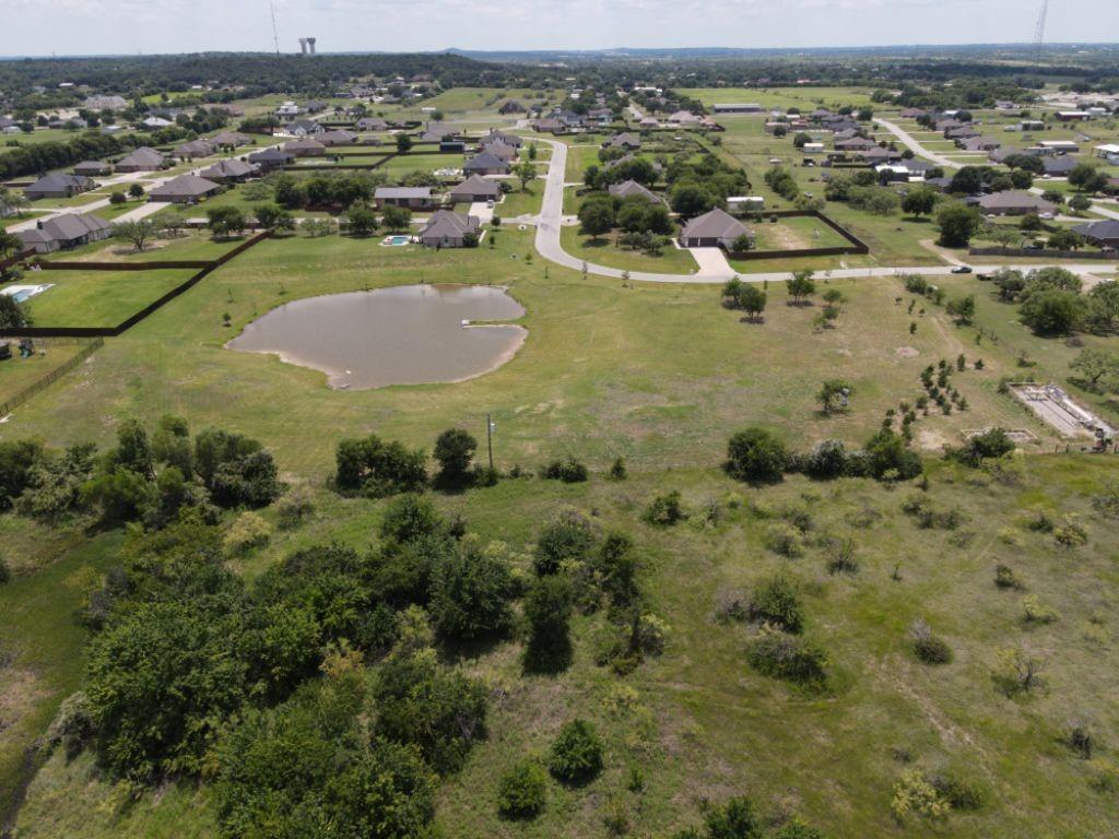 3322 Mariposa Ridge Crowley, TX 76036 - Photo 4 of 34 an aerial view of residential houses with outdoor space