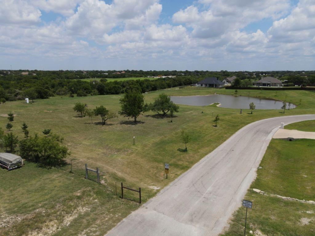 3322 Mariposa Ridge Crowley, TX 76036 - Photo 5 of 34 a view of a lake with houses in the back