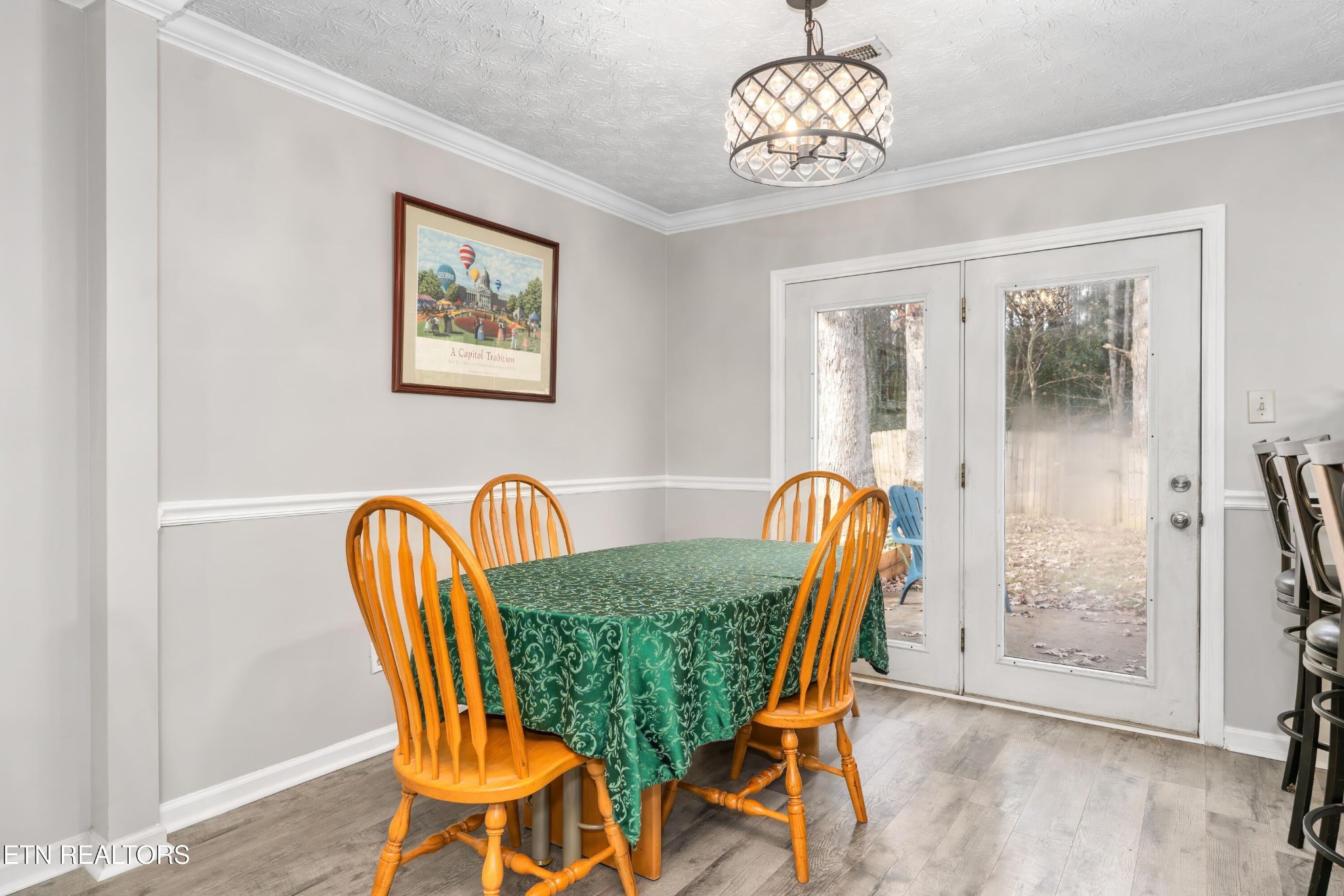 1935 Poplar Hill Road Knoxville, TN 37922 - Photo 3 of 25 a view of a dining room with furniture and wooden floor