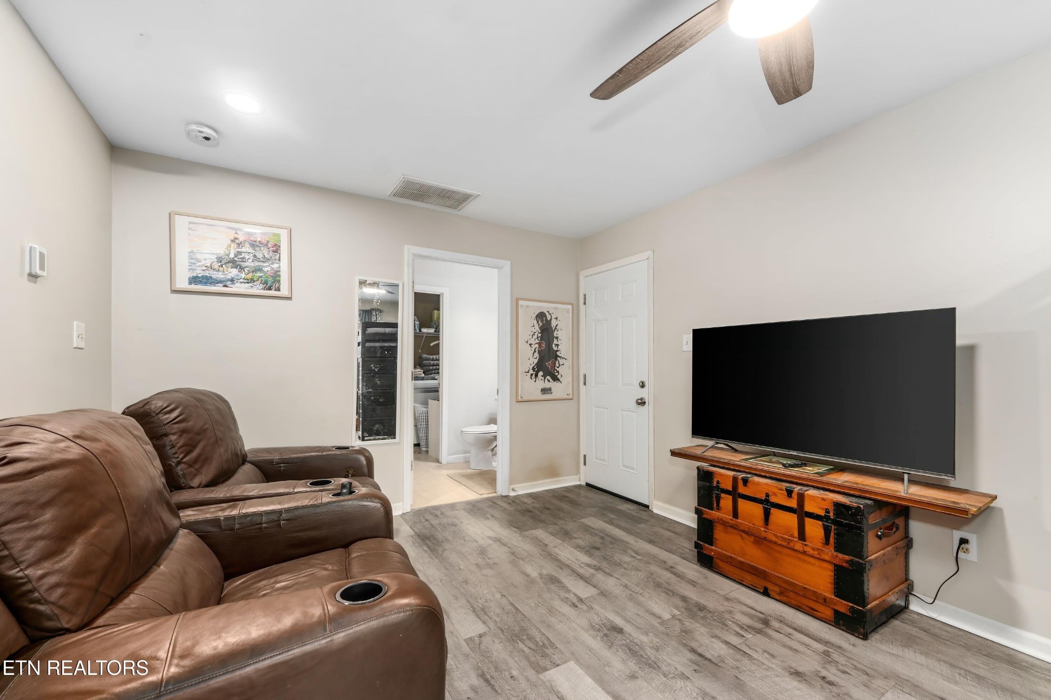 1935 Poplar Hill Road Knoxville, TN 37922 - Photo 7 of 25 a living room with furniture and a flat screen tv