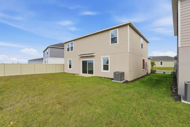 a picture of a wall with a white wall and sign