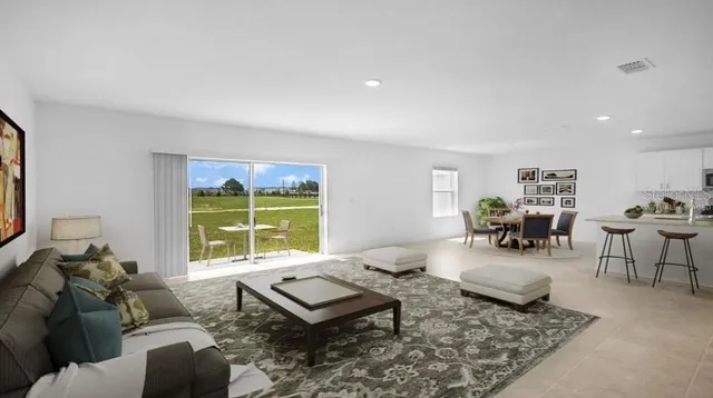 a kitchen with granite countertop a sink and appliances