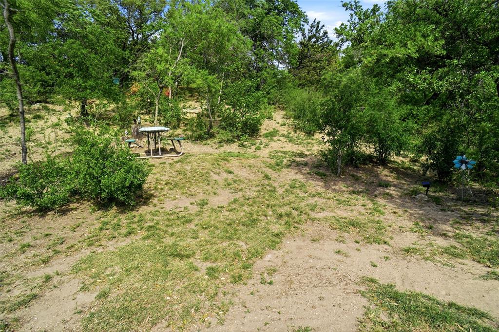 1024 Tex Lane Springtown, TX 76082 - Photo 34 of 40 a view of outdoor space and wooden deck