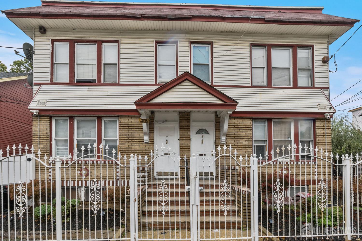 213 Maple Avenue, Unit 1 Irvington, NJ 07111 - Photo 1 of 17 a front view of a house