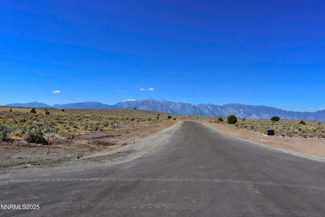 a view of a beach with a mountain
