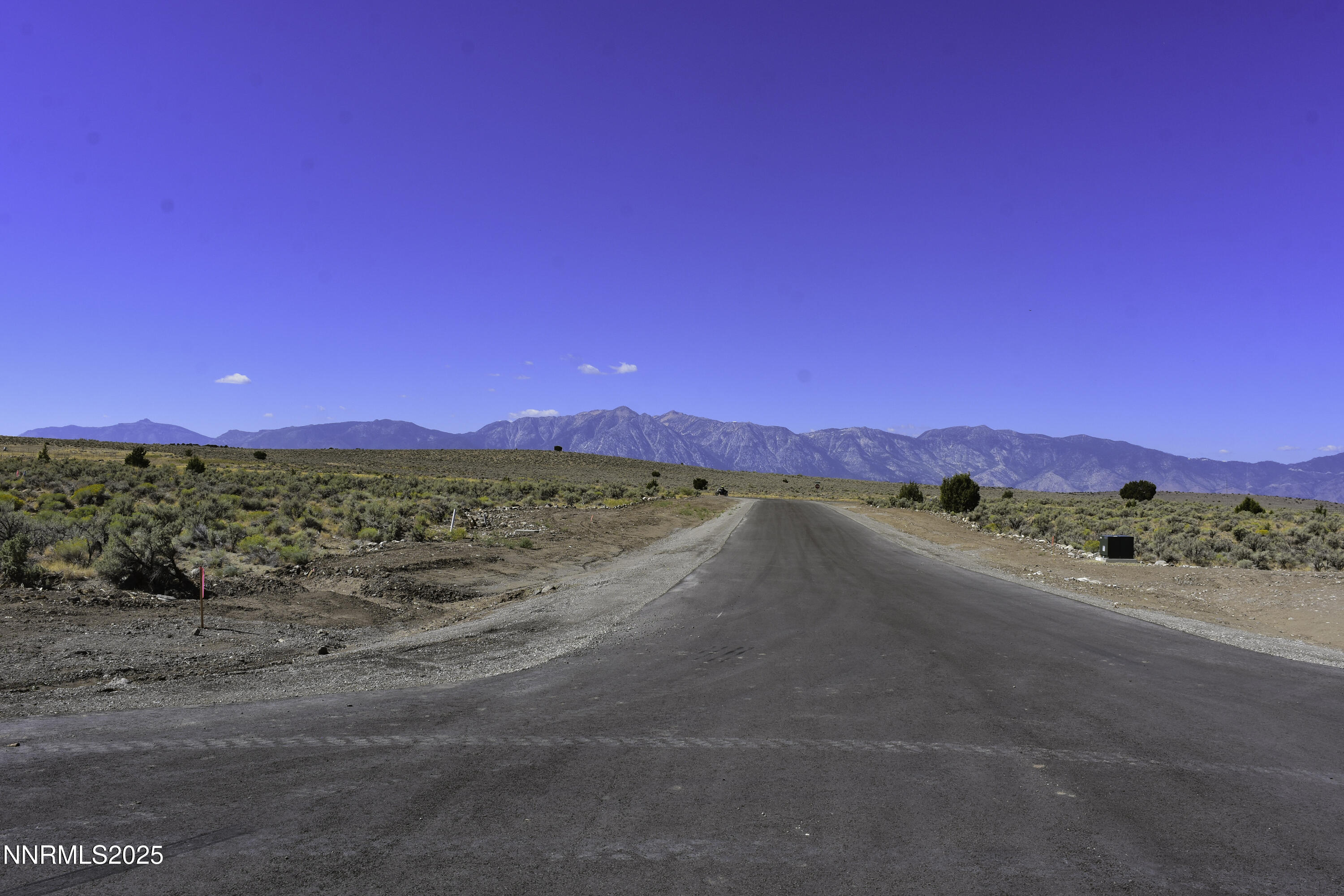 330 Veris Court, Unit 1 Gardnerville, NV 89410 - Photo 4 of 7 a view of a beach with a mountain