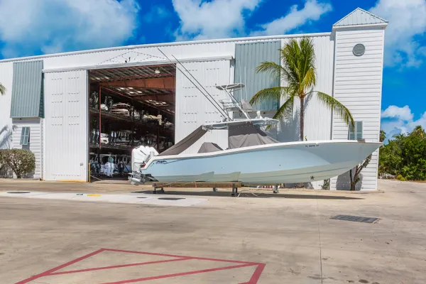a view of a house with basketball court