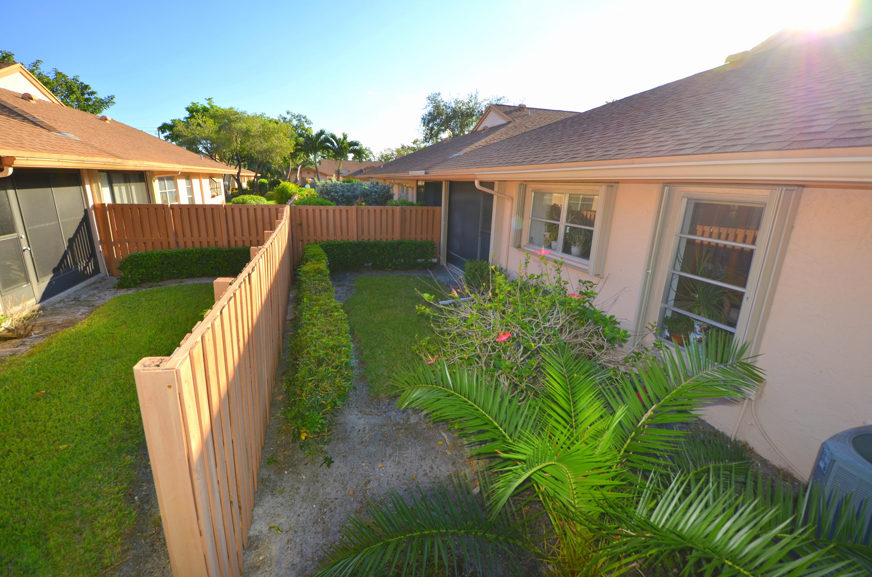 8202 Springtree Road Boca Raton, FL 33496 - Photo 21 of 28 side yard