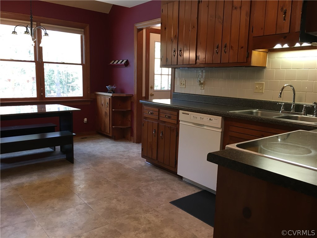 12236 Riverway Road Chesterfield, VA 23838 - Photo 15 of 44 a kitchen that has a sink and a stove