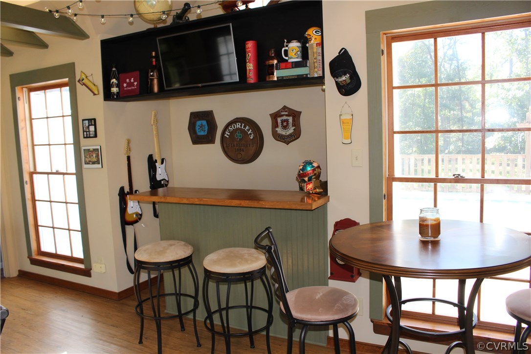 12236 Riverway Road Chesterfield, VA 23838 - Photo 20 of 44 a view of a dining room with furniture and wooden floor