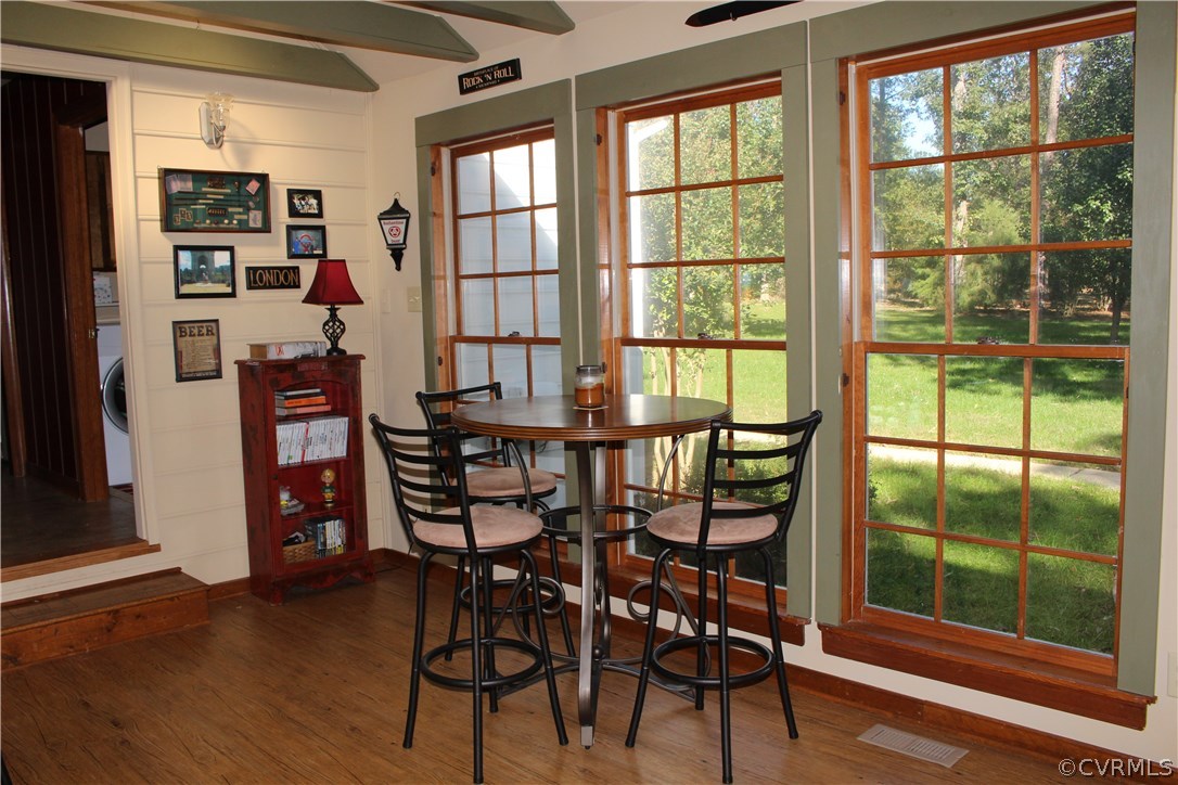 12236 Riverway Road Chesterfield, VA 23838 - Photo 22 of 44 a view of a dining room with furniture window and wooden floor