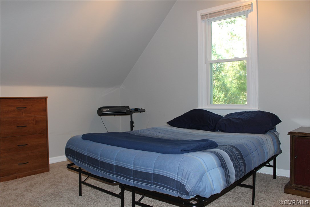 12236 Riverway Road Chesterfield, VA 23838 - Photo 27 of 44 a bedroom with a bed and a window