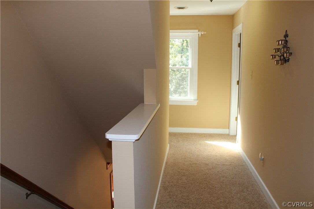 12236 Riverway Road Chesterfield, VA 23838 - Photo 32 of 44 a view of a hallway with windows