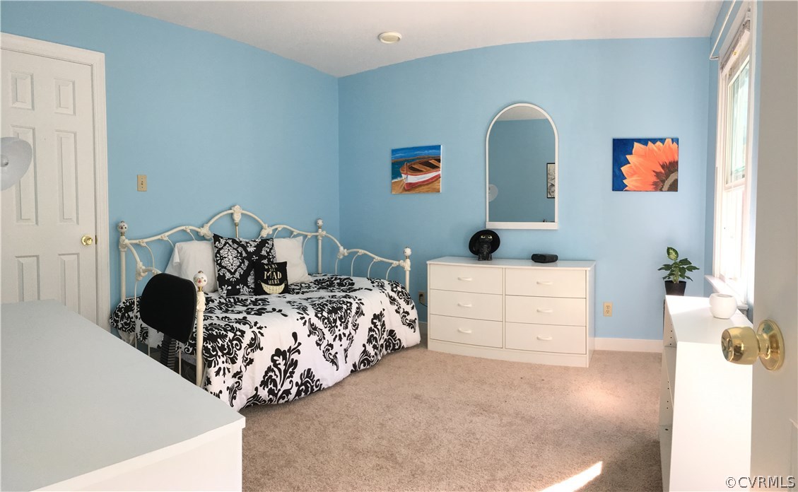 12236 Riverway Road Chesterfield, VA 23838 - Photo 34 of 44 a bed room with a bed and a dresser
