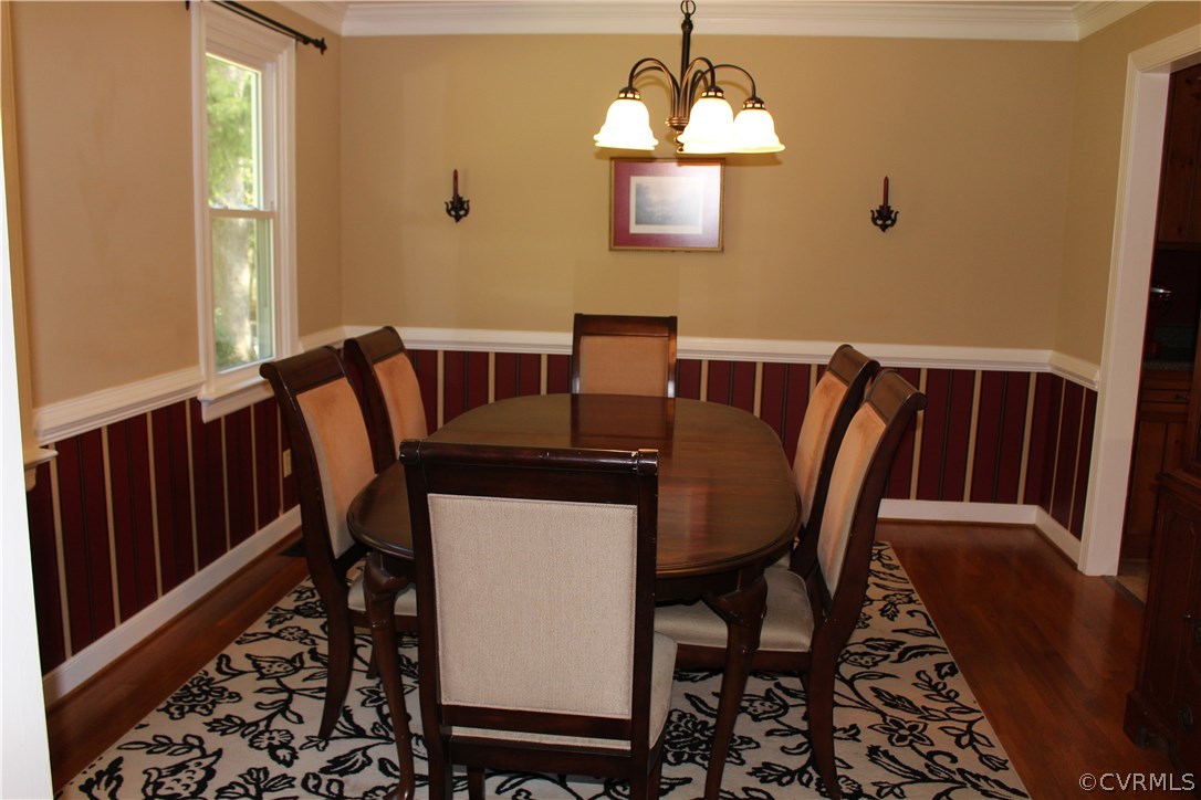 12236 Riverway Road Chesterfield, VA 23838 - Photo 8 of 44 a view of a dining room with furniture window and wooden floor