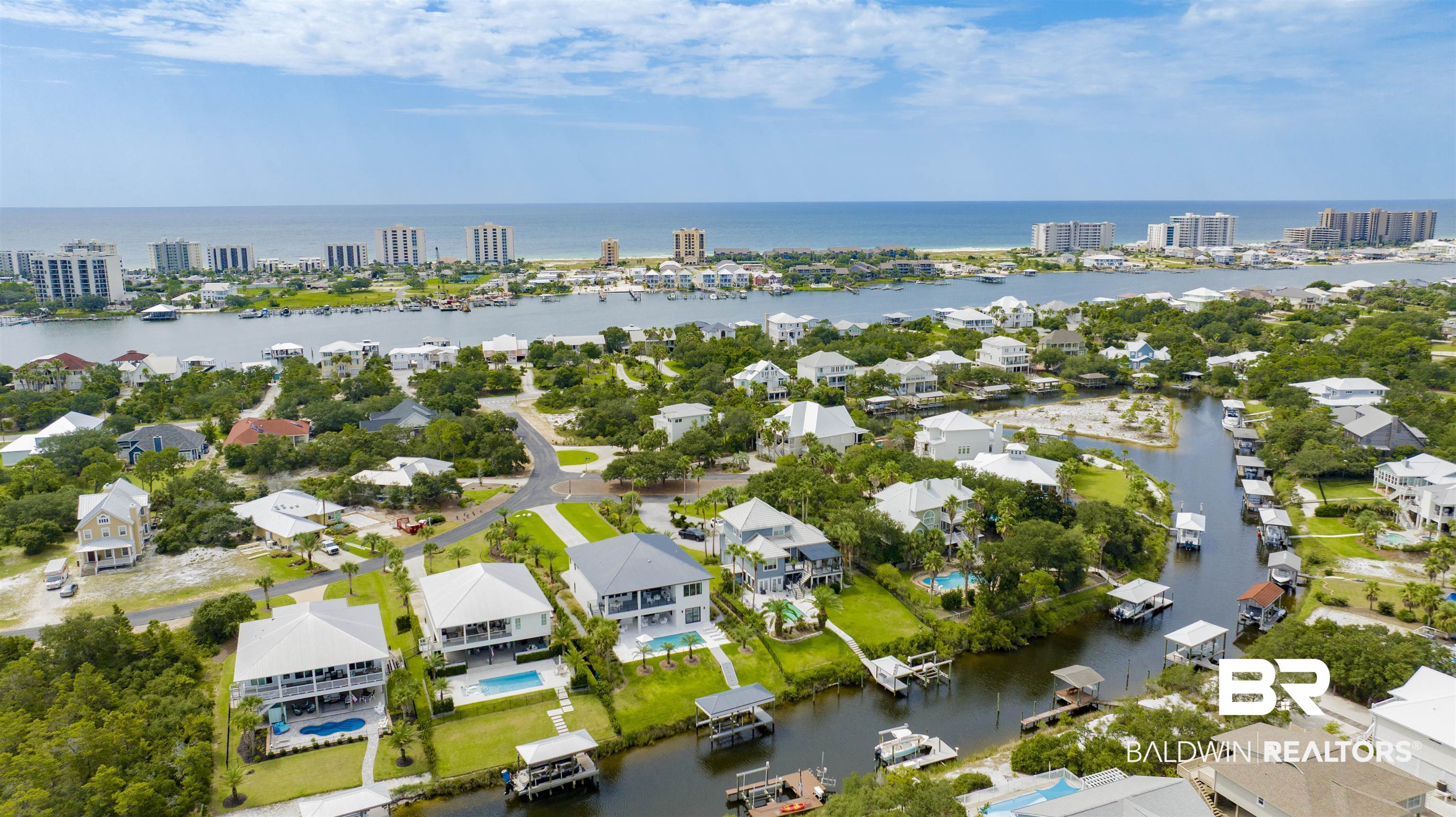 30239 Canal Court Orange Beach, AL 36561 - Photo 69 of 70 Aerial perspective of suburban area featuring a nearby body of water