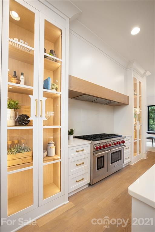 508 Westbury Road Charlotte, NC 28211 - Photo 12 of 48 a kitchen with stainless steel appliances a stove and a cabinet