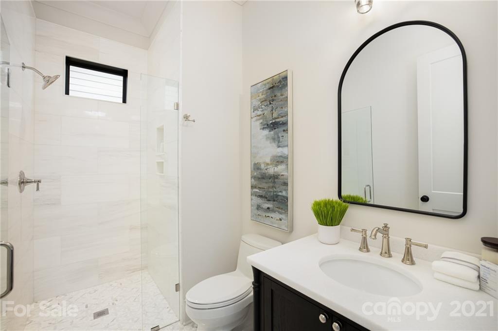 508 Westbury Road Charlotte, NC 28211 - Photo 13 of 48 a bathroom with a sink toilet and shower