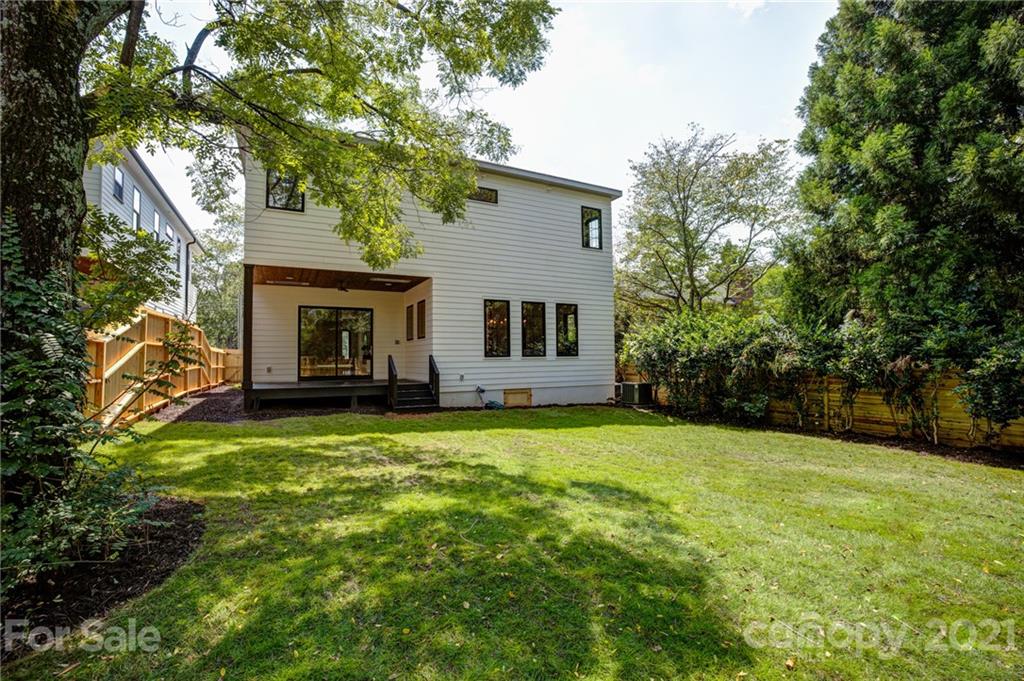 508 Westbury Road Charlotte, NC 28211 - Photo 15 of 48 a view of a house with backyard porch and garden