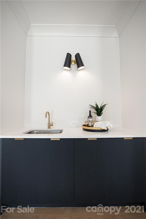 508 Westbury Road Charlotte, NC 28211 - Photo 19 of 48 a sink with a potted plant on it