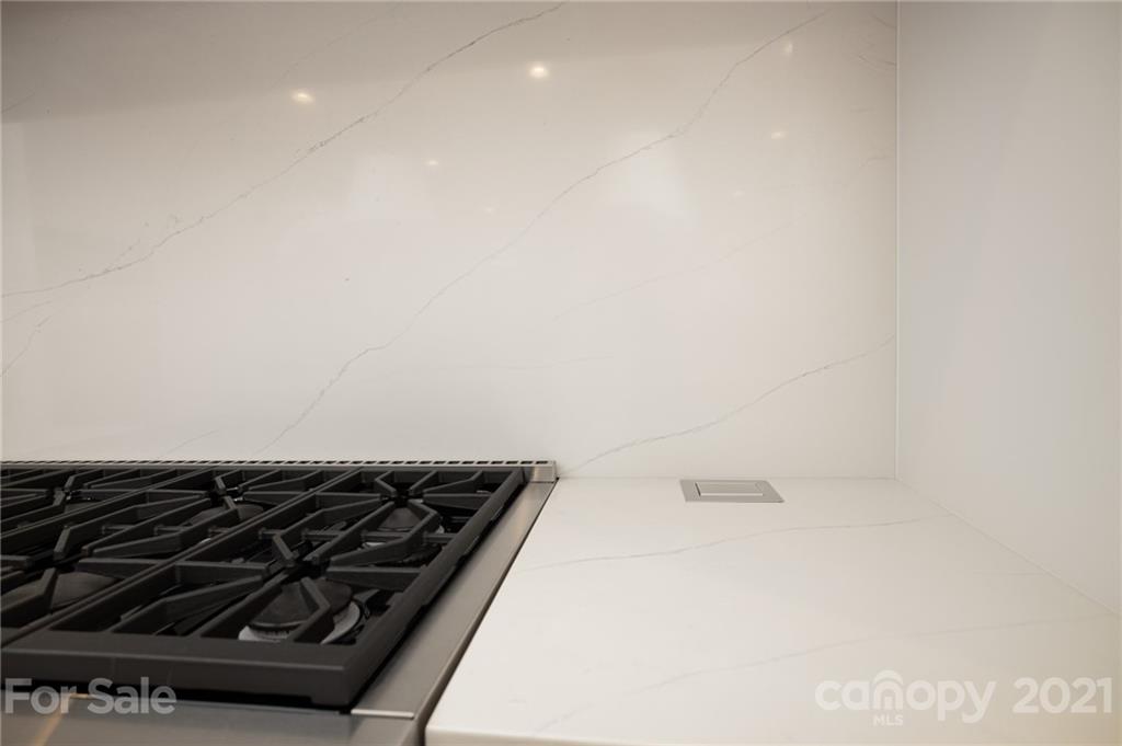 508 Westbury Road Charlotte, NC 28211 - Photo 21 of 48 a close up of a stove in a kitchen