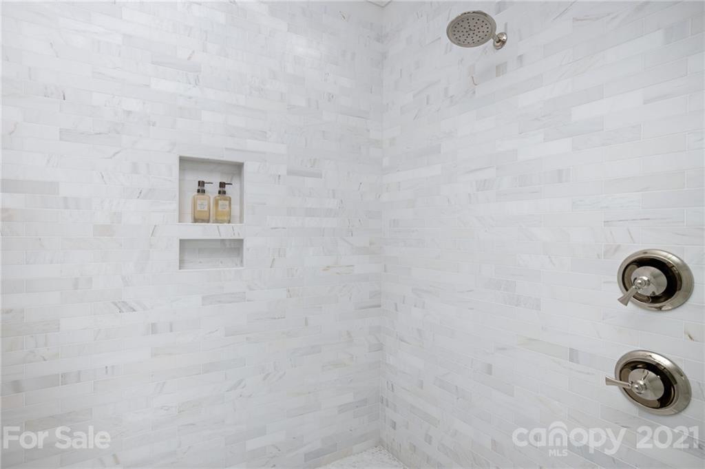 508 Westbury Road Charlotte, NC 28211 - Photo 45 of 48 a bathroom with a shower