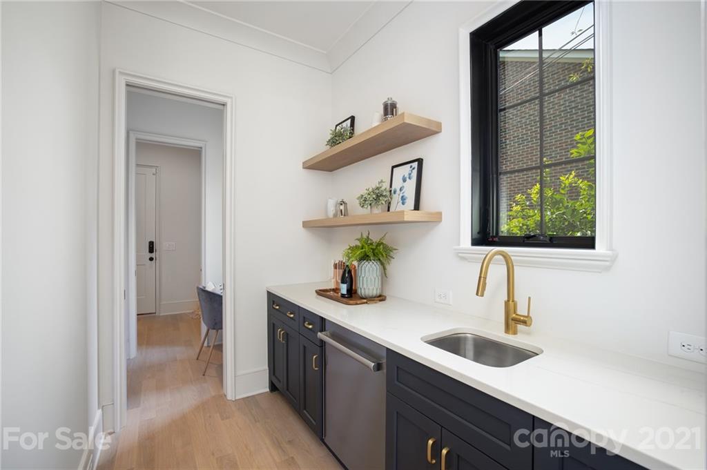 508 Westbury Road Charlotte, NC 28211 - Photo 7 of 48 a kitchen with a sink and a window