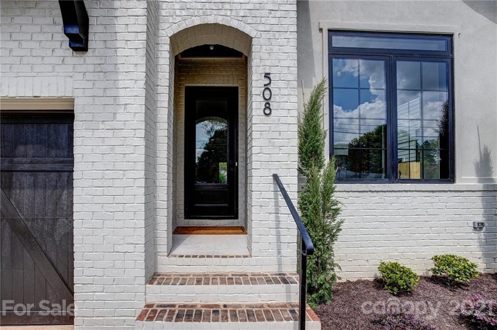 508 Westbury Road Charlotte, NC 28211 - Photo 10 of 48 a front view of a house with porch