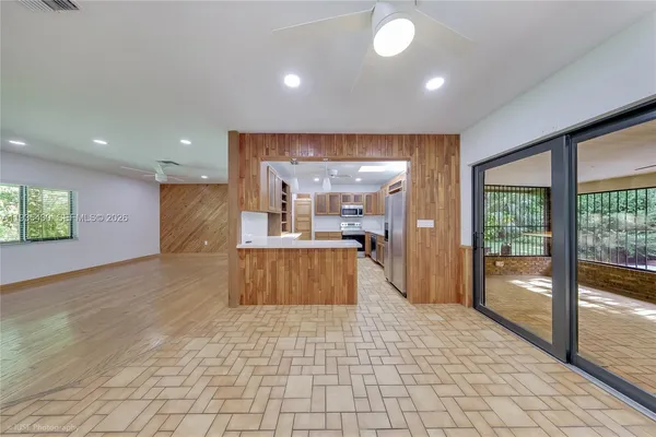 a large space with kitchen view