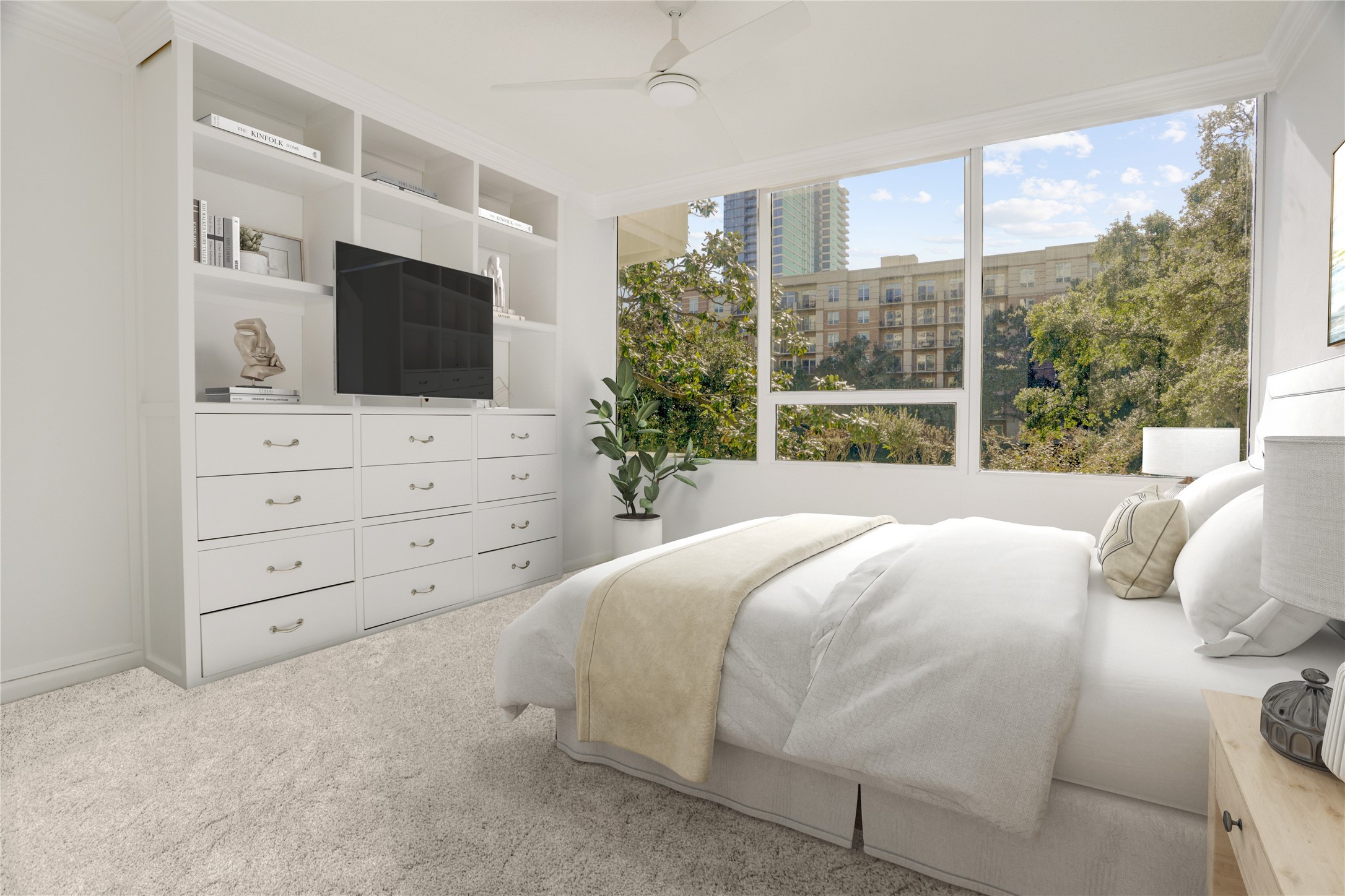 2701 Westheimer Road, Unit 2D Houston, TX 77098 - Photo 12 of 48 a bedroom with a large bed and a flat tv screen on dresser