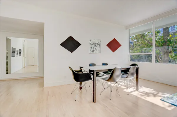 a view of a living room and dining room