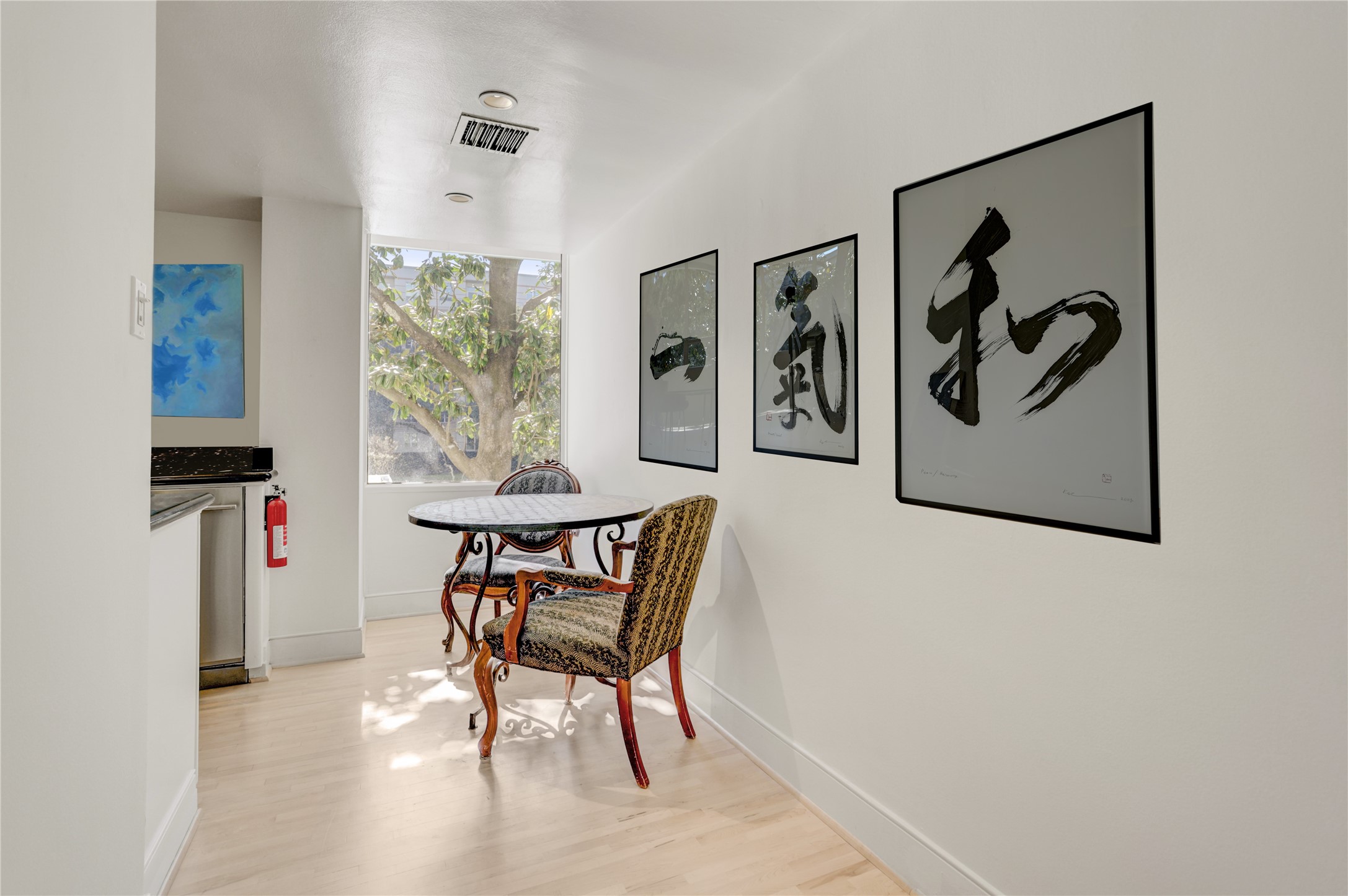 2701 Westheimer Road, Unit 2D Houston, TX 77098 - Photo 22 of 48 a dining room with furniture and window