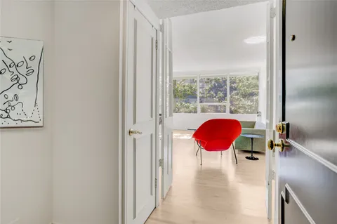a view of a living room and a rug