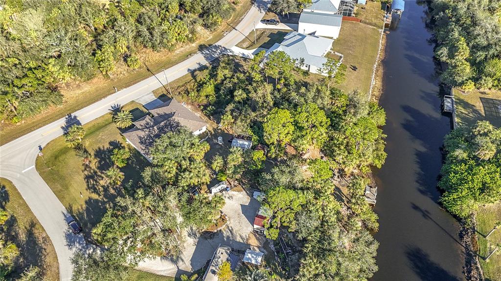 3252 Como Street Port Charlotte, FL 33948 - Photo 15 of 17 a aerial view of a house with a yard and plants