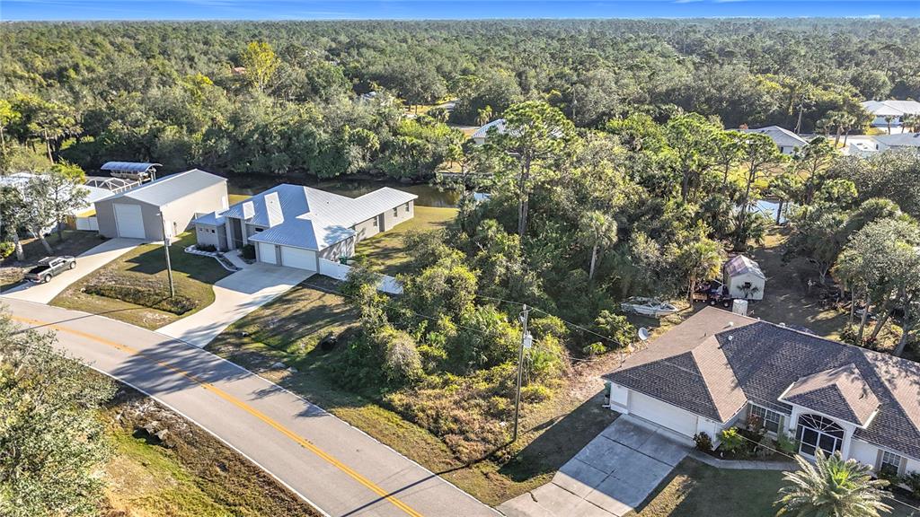 3252 Como Street Port Charlotte, FL 33948 - Photo 2 of 17 an aerial view of residential house with outdoor space