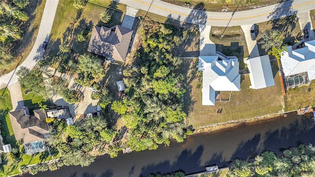 3252 Como Street Port Charlotte, FL 33948 - Photo 8 of 17 an aerial view of residential houses with outdoor space