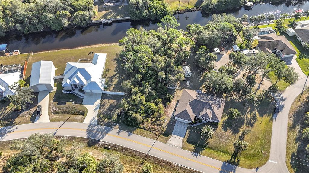 3252 Como Street Port Charlotte, FL 33948 - Photo 10 of 17 an aerial view of house with yard and lake view
