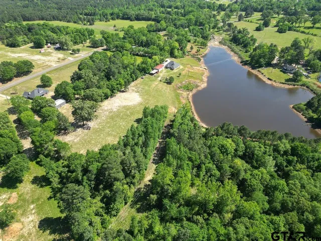 a view of a yard with an outdoor space