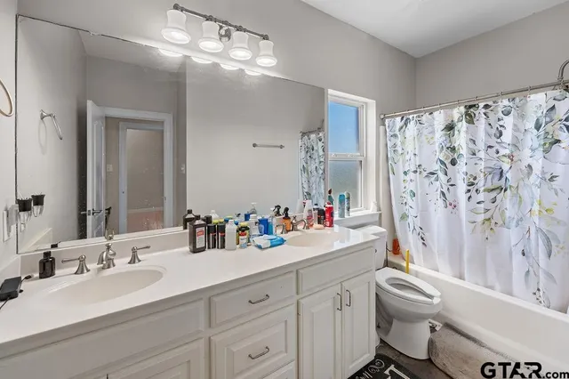 a view of a livingroom with table and chair