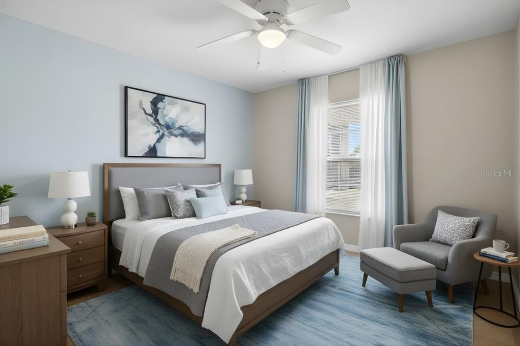 1 Pecan Course Circle Ocala, FL 34472 - Photo 10 of 24 a bedroom with a bed and a chandelier