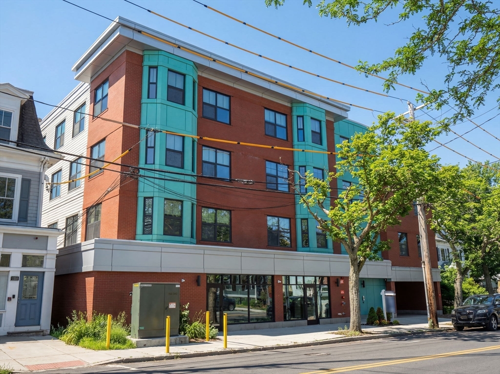 1151 Walnut Street, Unit 207 Newton, MA 02461 - Photo 2 of 27 a view of a building with a street