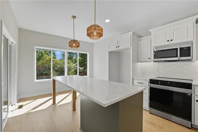 $350,000 | 205 Northwest Orchard Drive, Lee's Summit, MO 64063