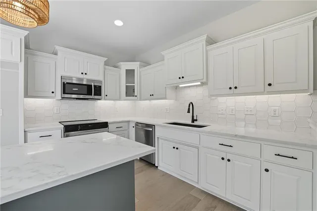 $350,000 | 205 Northwest Orchard Drive, Lee's Summit, MO 64063