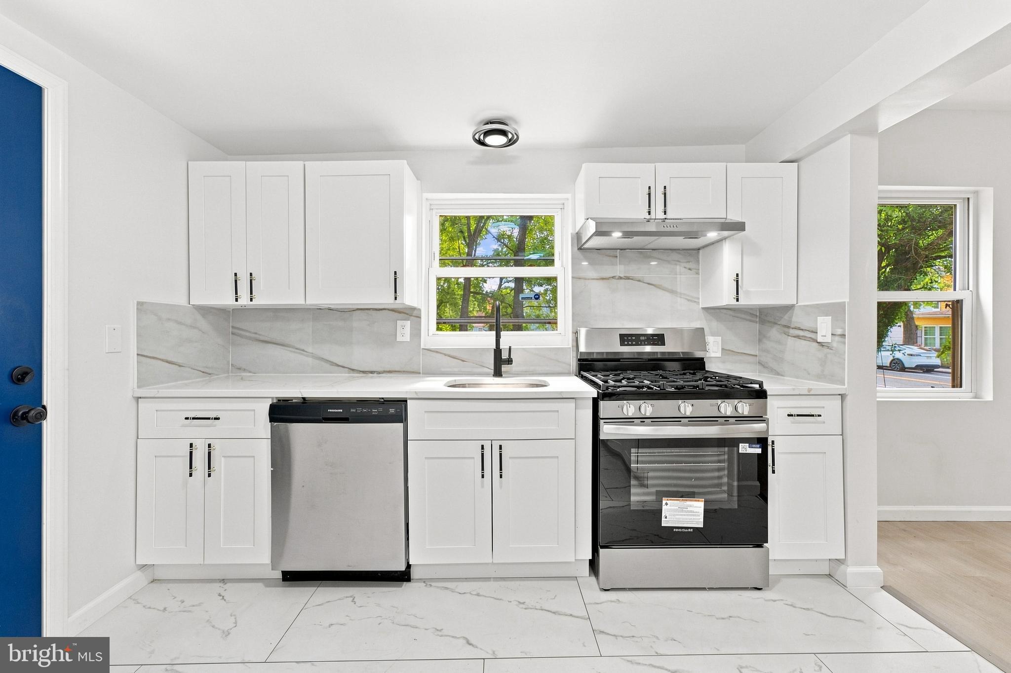 185 Rancocas Road Mount Holly, NJ 08060 - Photo 6 of 34 a kitchen with cabinets appliances and a window