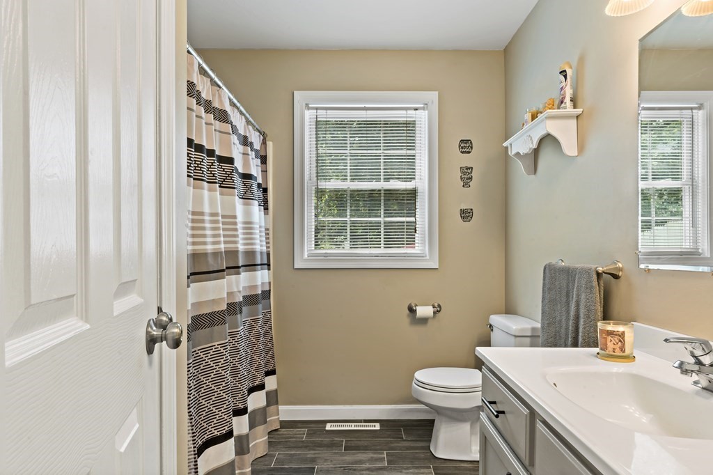 29 Florence Street Fall River, MA 02720 - Photo 11 of 34 a bathroom with a sink toilet and shower