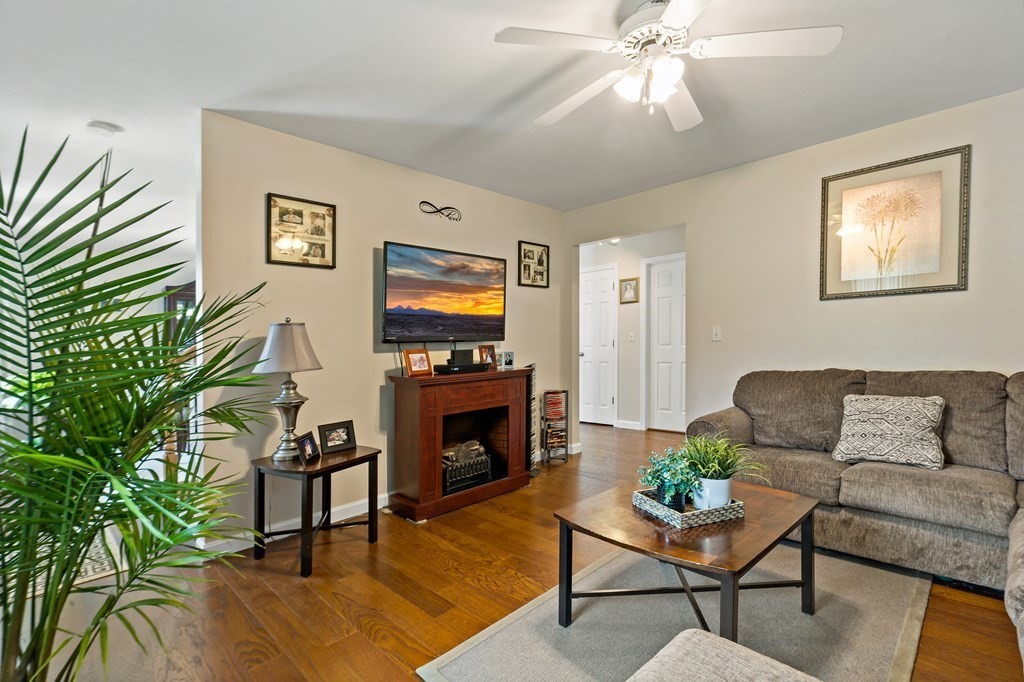 29 Florence Street Fall River, MA 02720 - Photo 14 of 34 a living room with furniture and a fireplace