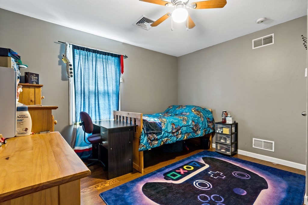 29 Florence Street Fall River, MA 02720 - Photo 22 of 34 a bed room with furniture and a window