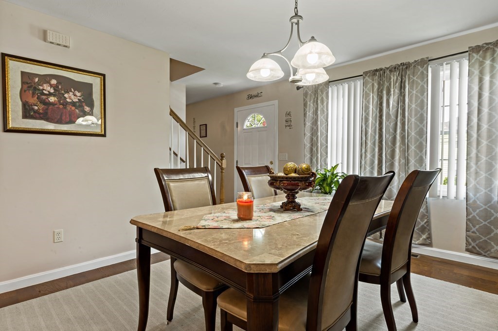 29 Florence Street Fall River, MA 02720 - Photo 3 of 34 a view of a dining room with furniture and wooden floor